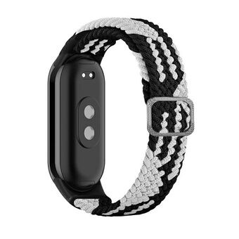 Beline pasek Mi Band 8 Textile czarno/biały tarkoittaa mustan ja valkoisen värin tekstiiliranneke Mi Band 8:lle.