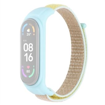 Xiaomi Mi Band 3 / Band 4 / Band 5 / Band 6 / Band 7 Nylon Sport Band säädettävä katoamista estävä rannekoru silikonikellokotelolla